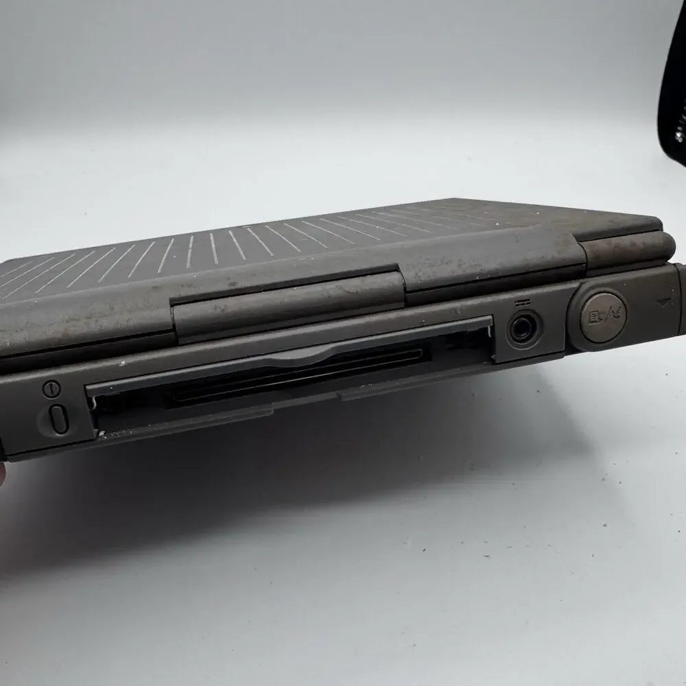 Vintage Apple Macintosh PowerBook Duo 2300c PowerPC Laptop Powers On AC Adapter